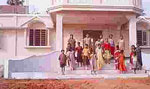 a group of students and teachers standing in front of their new school center